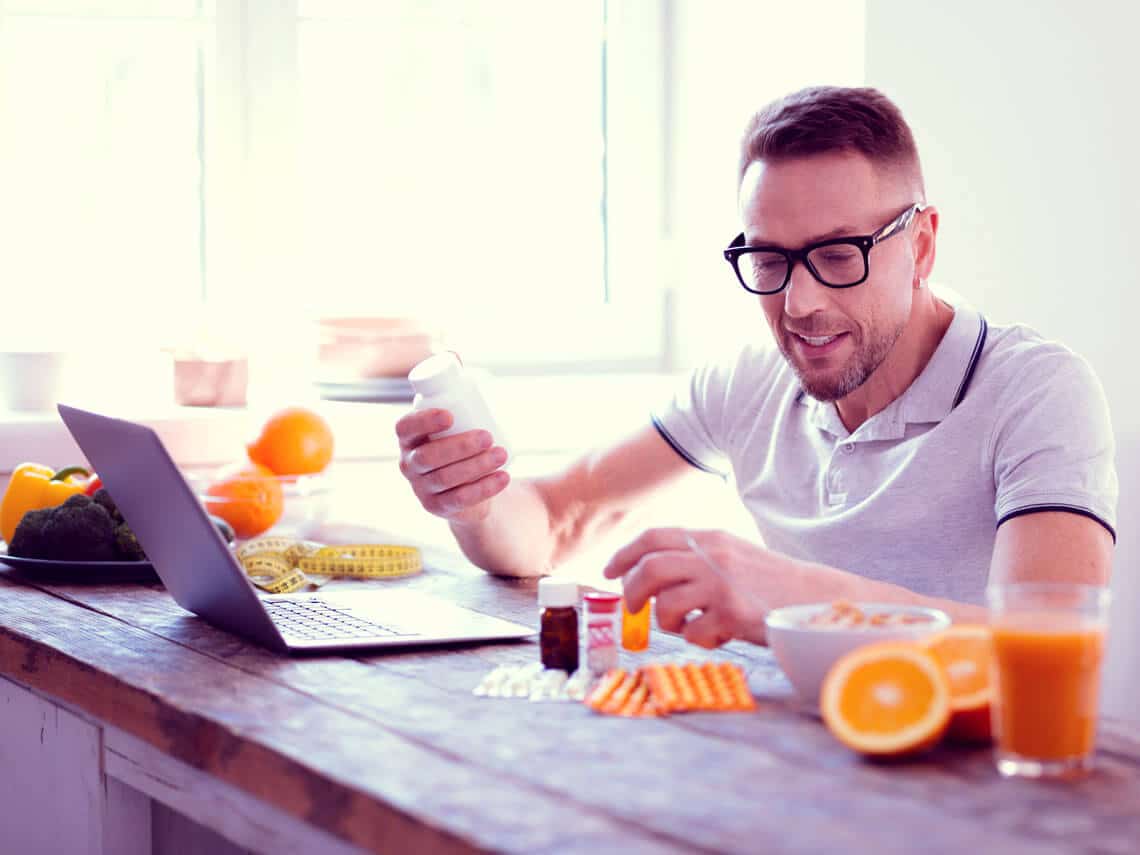 Man considering supplement options for prostate health